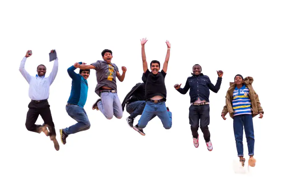 Six jumping friends on a clean white background after AI background removal
