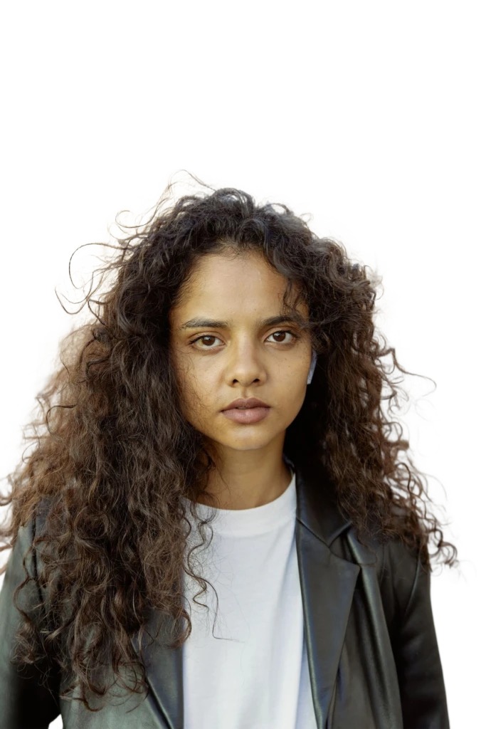 Background removal example: woman with voluminous curly hair as a transparent cutout
