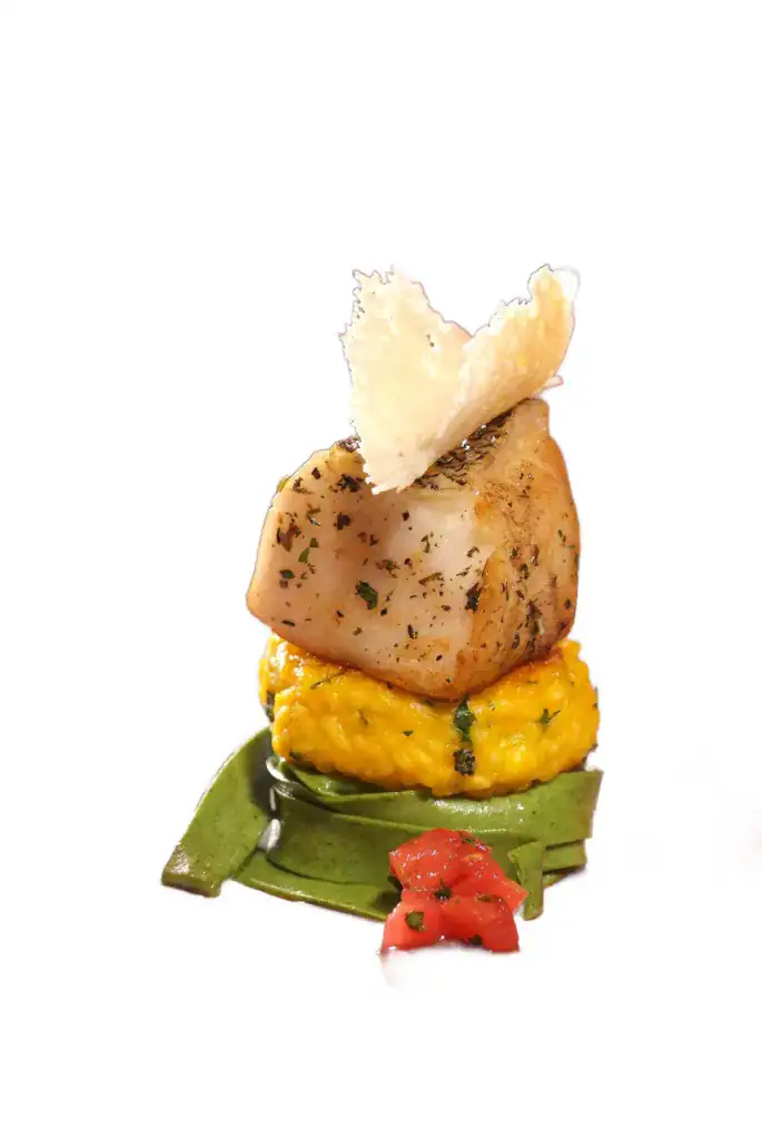 Scallop dish on a clean white background after AI background removal