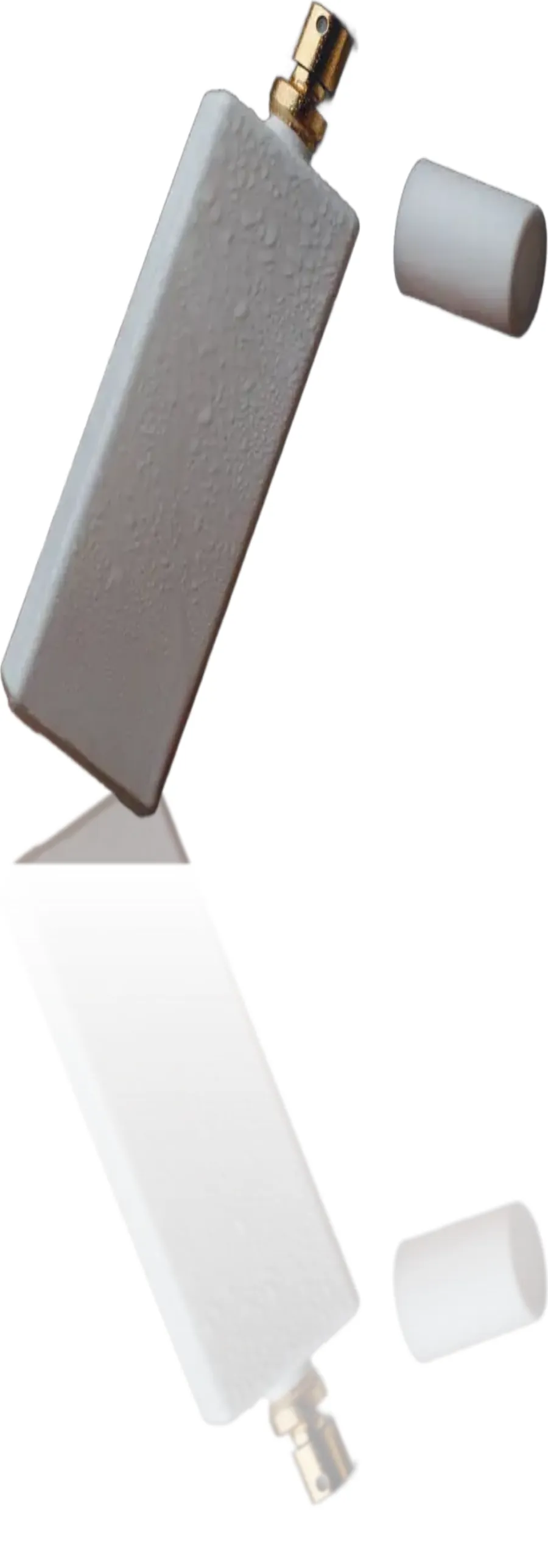 Perfume bottle with a fading mirror reflection below it